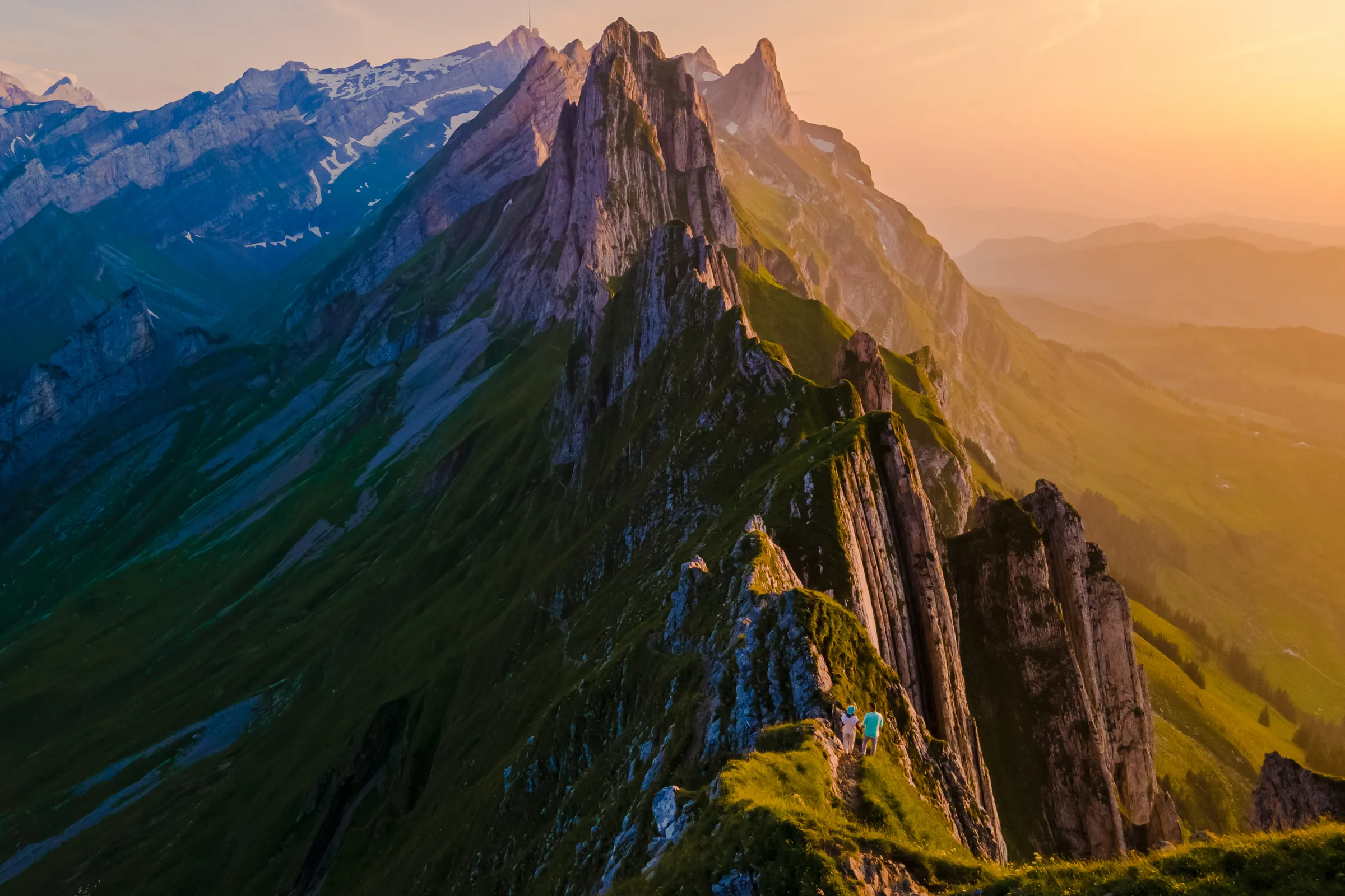 Sunlit mountain ridge at golden hour